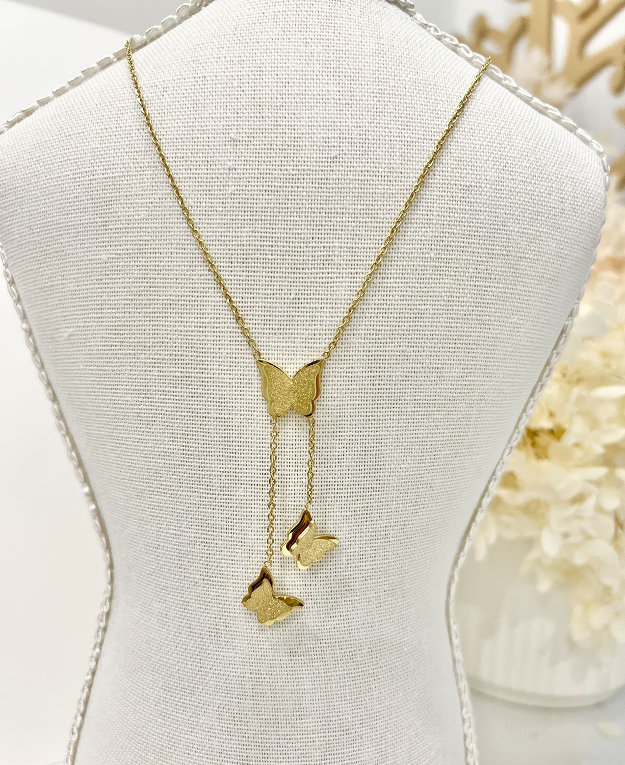 Gold butterfly necklace