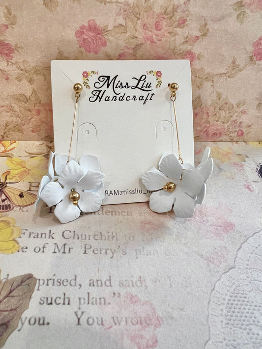 White flower dangling earring