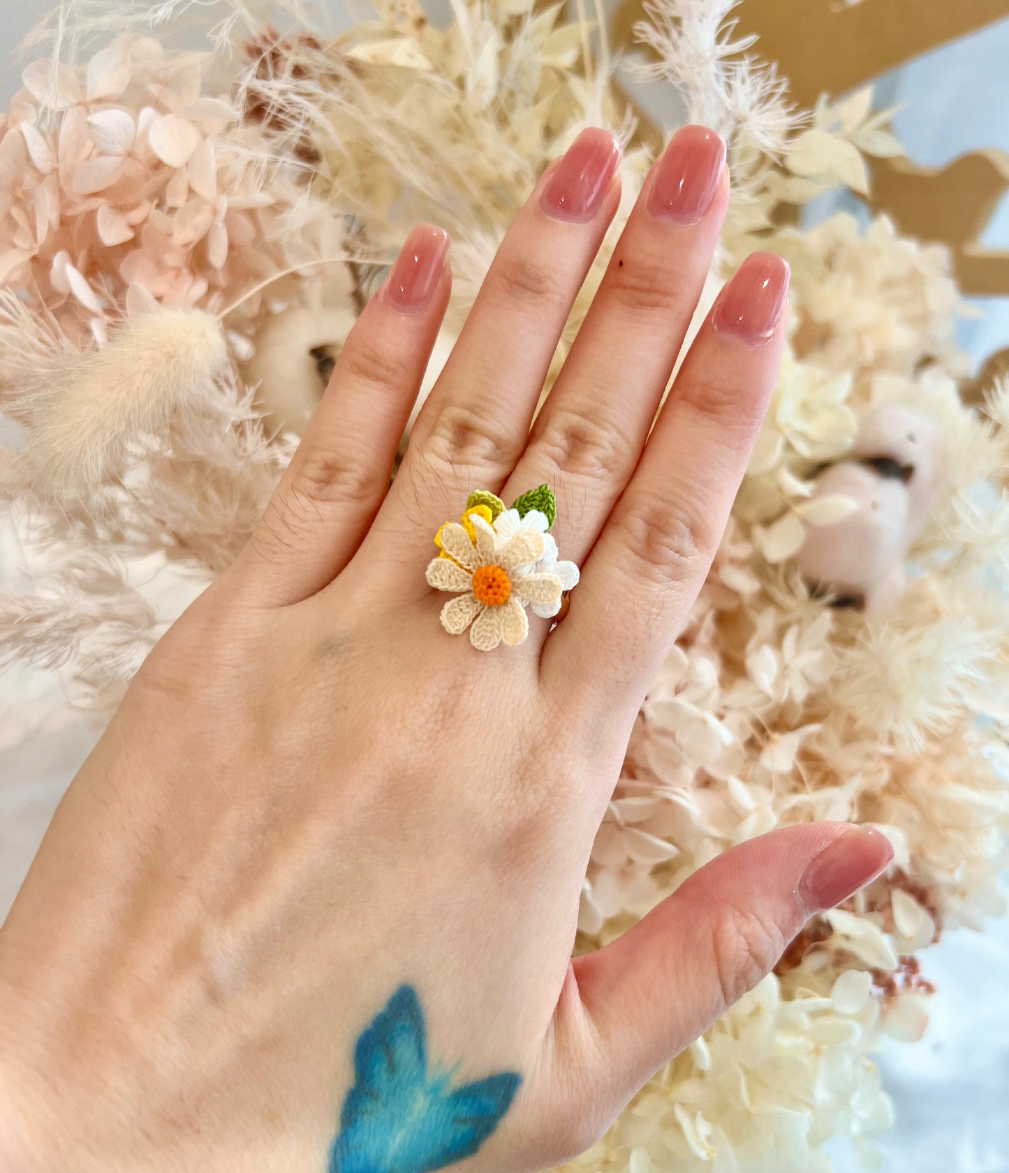 Handmade crochet multi-flower ring in orange